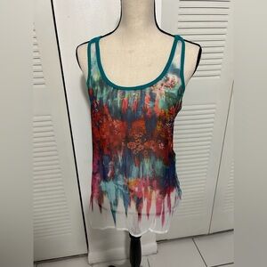 Colorful mesh tank top with abstract flower pattern and blue back. Not sheer